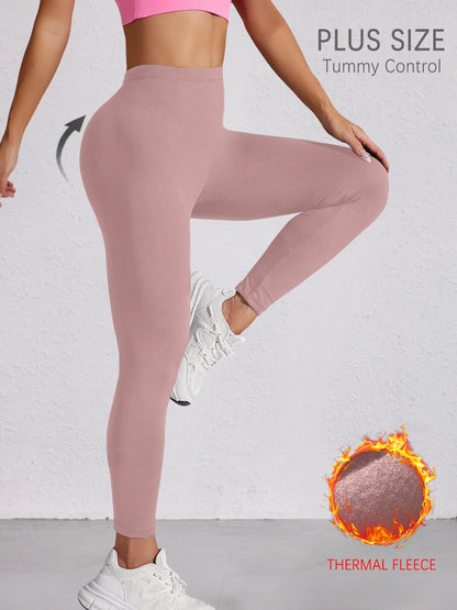 Plus Size Women's Low Rise leggings with thermal technology. Designed for winter running, yoga and keeping warm during workout